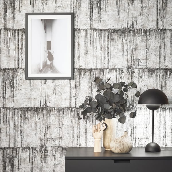 Galerie Wallpaper Product code: 95024_2 - Air Wallpaper Collection - Black Colours - This aged concrete effect wallpaper is the perfect choice if you want to bring a room up to date in a dramatic way. With a subtle emboss to create some structural depth, it comes in an on-trend monochrome colourway. Drawing on the textures of, and resembling the stippled texture of ancient plasterwork or faded limestone, this unusual wallpaper will be a warming welcome to your home. This will be perfect on all four walls or can be accompanied by a complementary wallpaper. Design